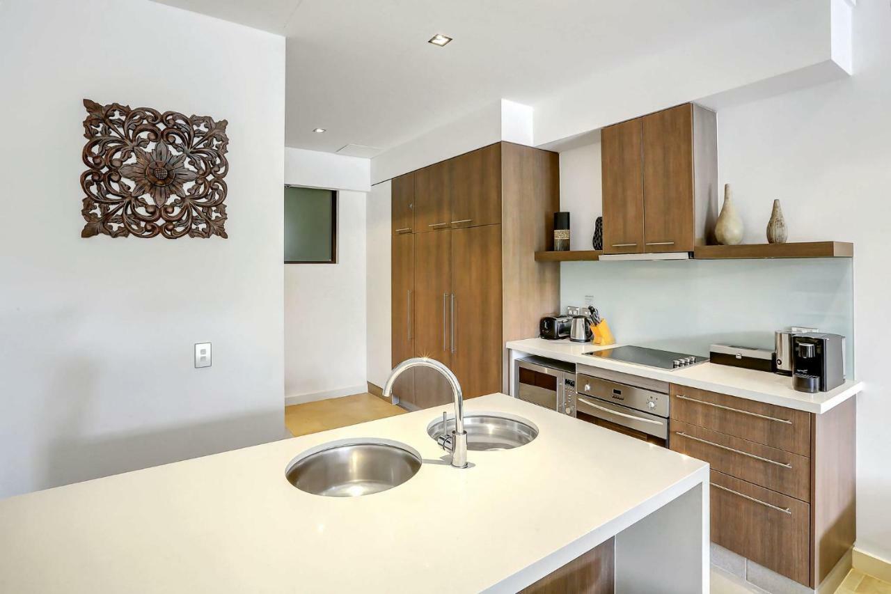 Elysium Private Apartments Triton By The Sea Palm Cove Bagian luar foto